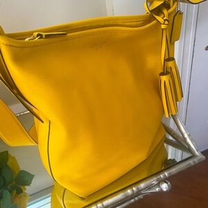 Stunning Coach leather bag with gold hardware.